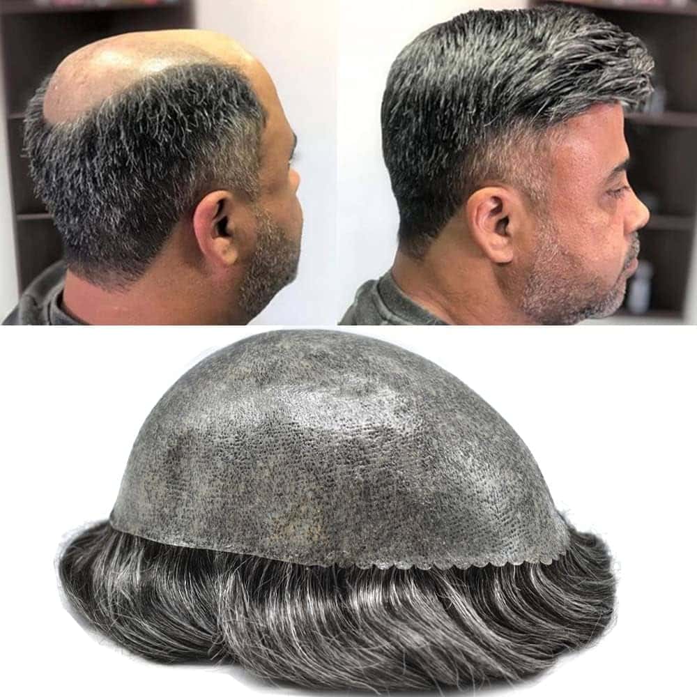 Man styling a wavy hair system in front of a mirror